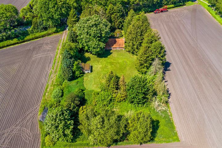 J. Buiskoolweg 1 in Bellingwolde foto