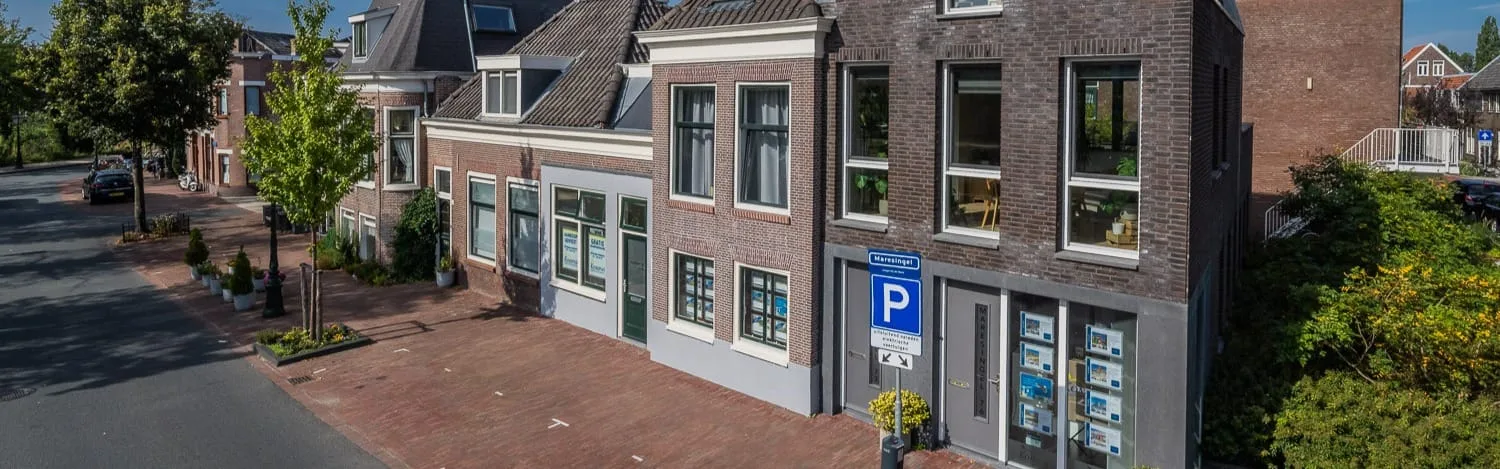 Team foto van Kompas makelaars & taxateurs