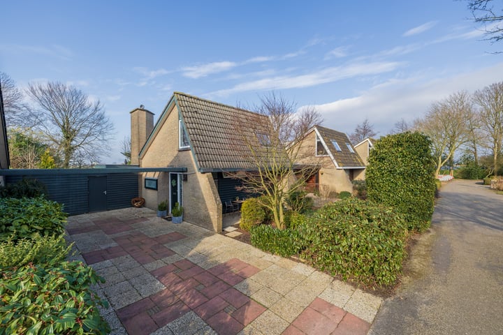 Watertuin 19 in Warmond foto