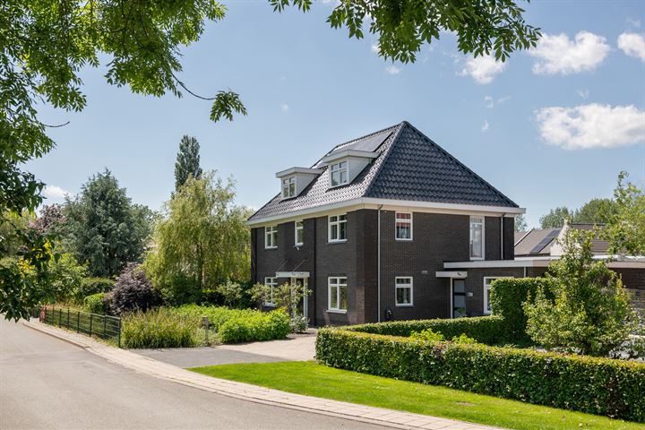 Dijkstoep 6 in Rhenoy foto