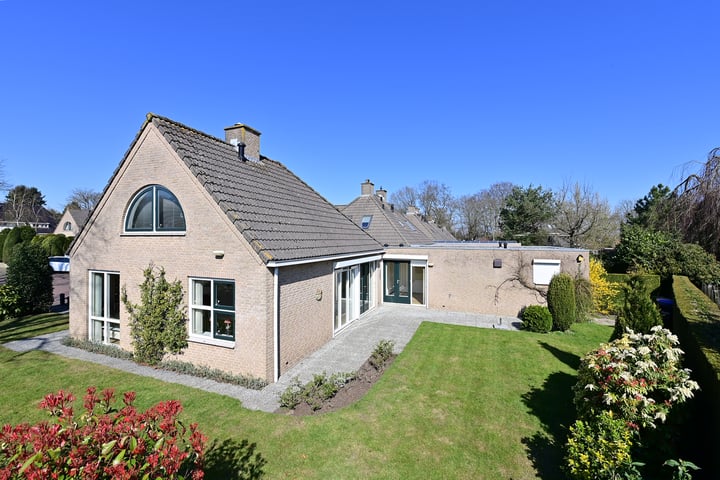 Foto van woning Dr. Willem Dreeslaan 15, Huizen