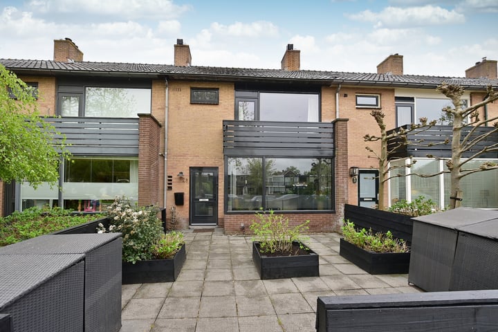 Foto van woning Gemeenlandslaan 28, Huizen
