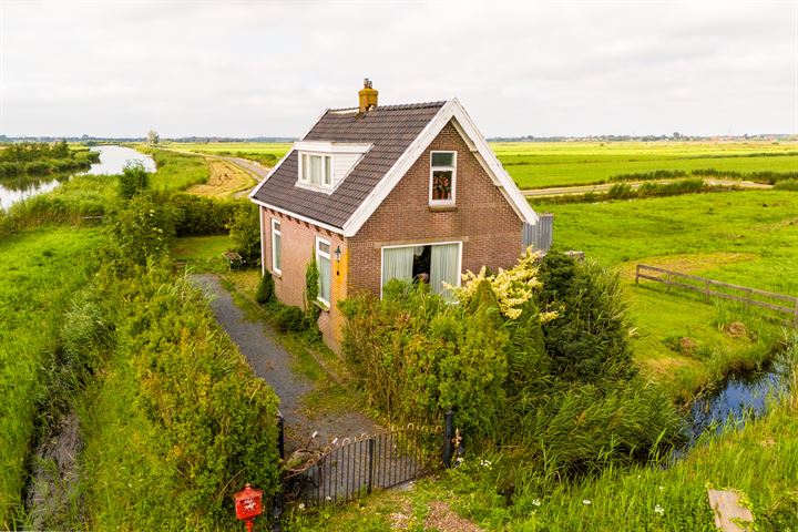 Oostzanerrijweg 1 in Purmerland foto