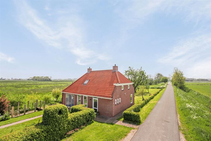 Spanjaardsdijk Zuid 1 in Aduard foto