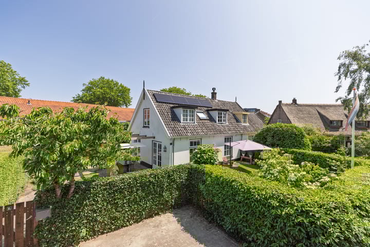 Foto van woning Valkenaarstraat 31, Huizen