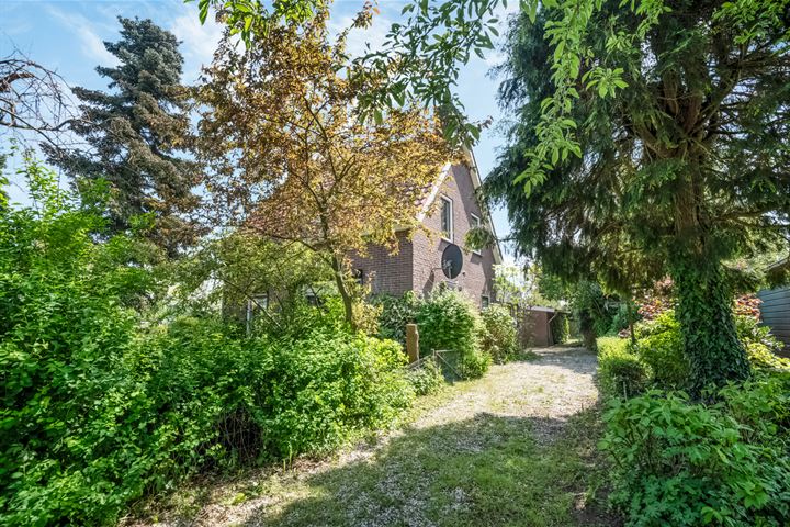 Zijweg Oude Tielseweg 1 in Wadenoijen foto